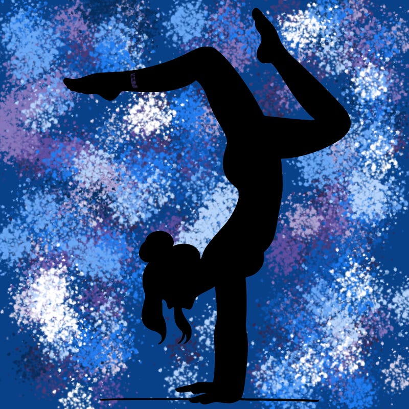 a woman doing a handstand