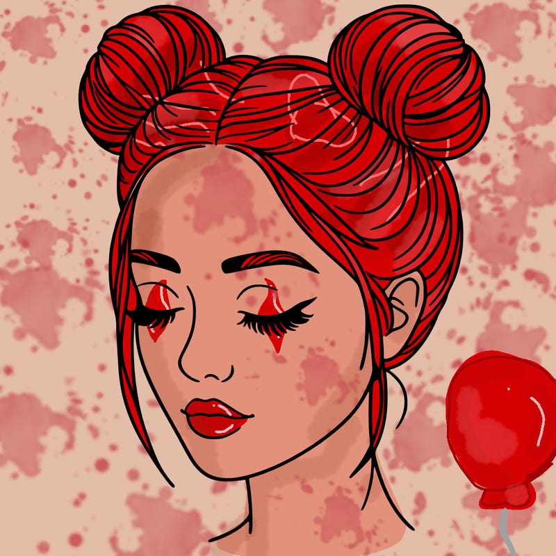 woman with hair buns