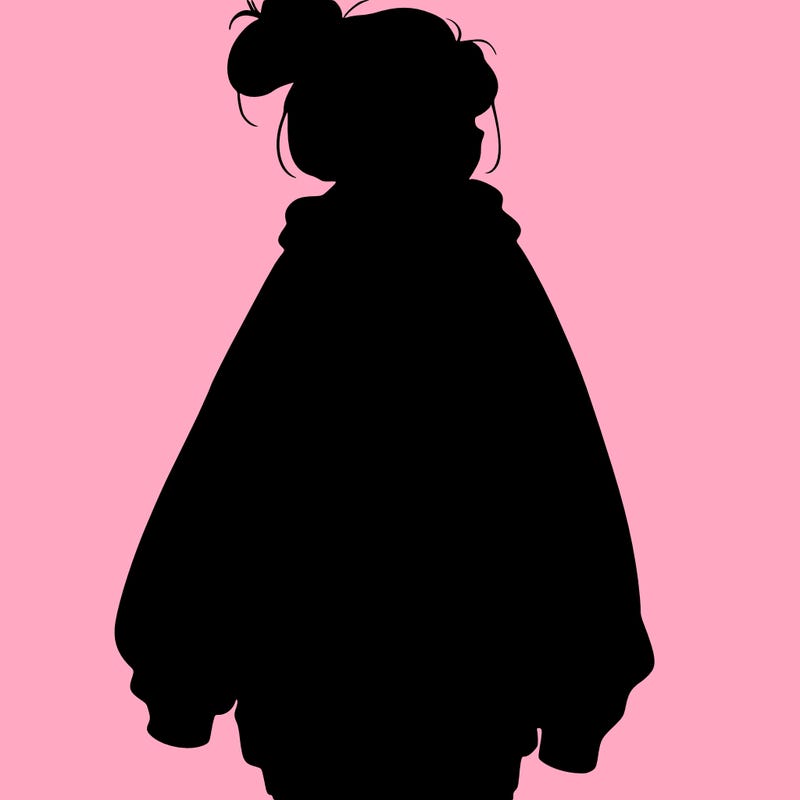 realistic girl with a oversized sweatshirt on and a bun