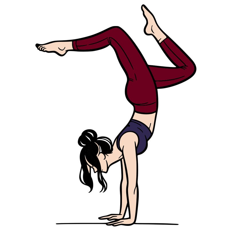 a woman doing a handstand