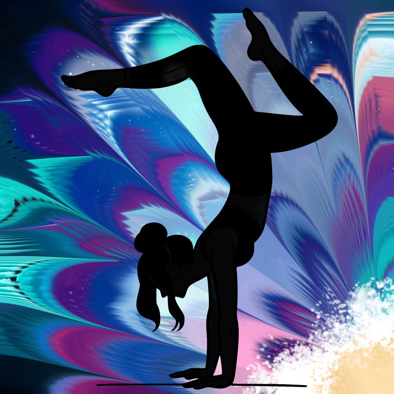 a woman doing a handstand