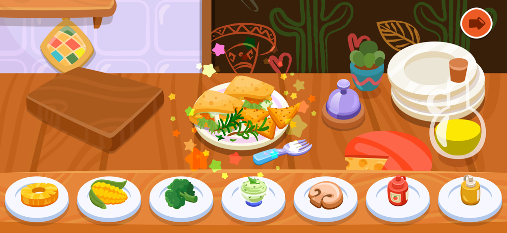 Um prato de tacos e nachos decorado com estrelas em um colorido jogo de culinária para crianças