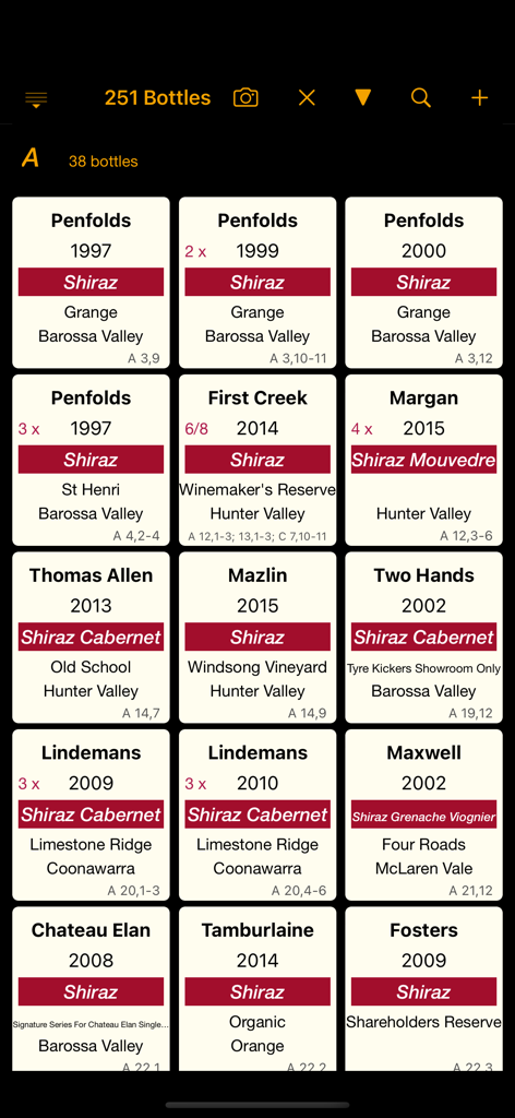 Digital wine cellar inventory grid displaying bottle details and storage locations