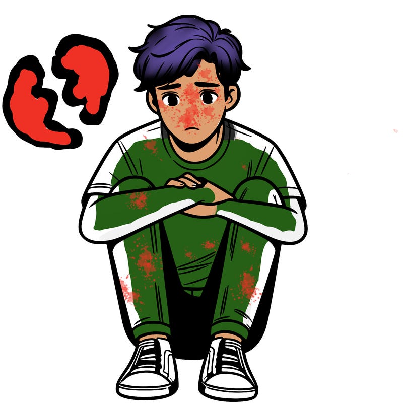 teen boy, sitting down with knees to his chest, sad
