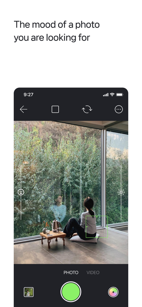 filmhwa app camera interface displaying an aesthetic photo of a person sitting by a window