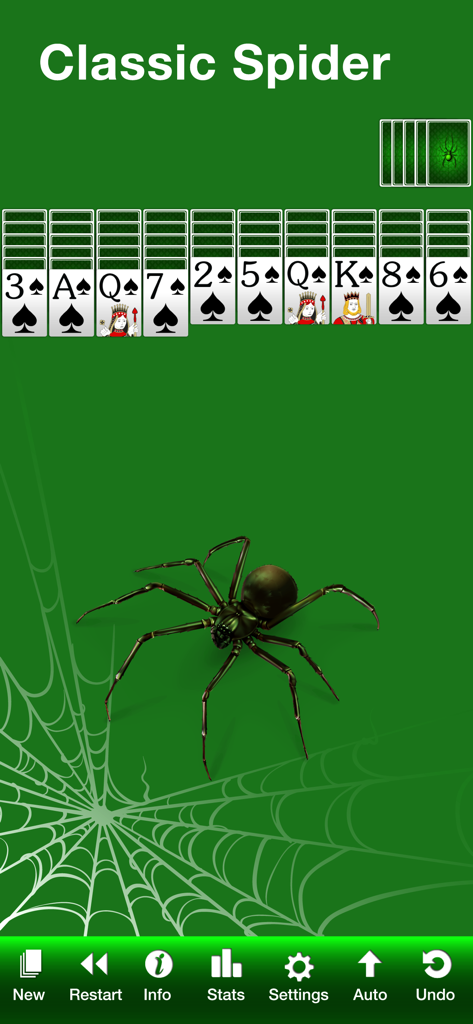 Spider Solitaire ‏‎ - 緑色の背景と大きなクモのグラフィックを備えたクラシックなSpider Solitaireゲームプレイ画面