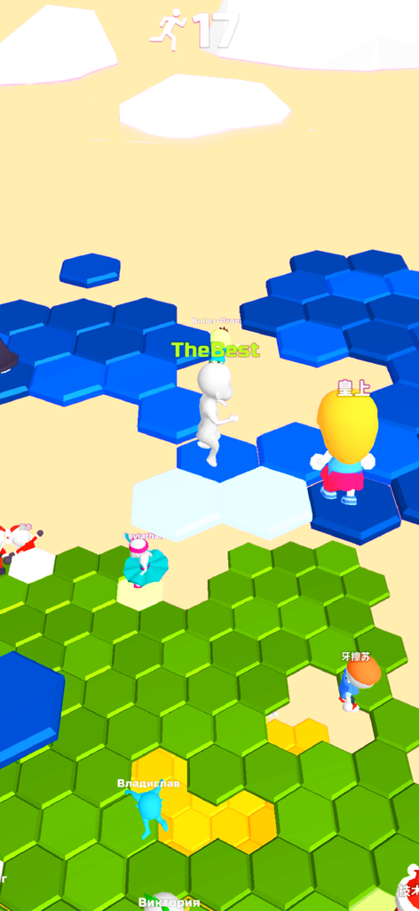 Do Not Fall .io - Jugabilidad multijugador en Do Not Fall .io mostrando personajes saltando en plataformas hexagonales coloridas.