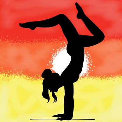 a woman doing a handstand