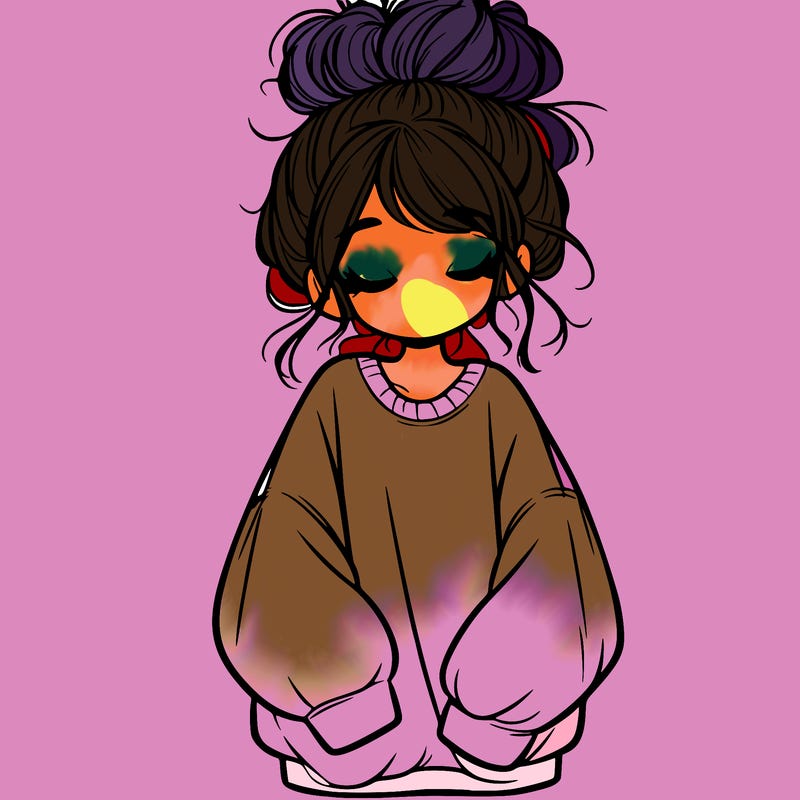 girl with baggy sweatshirt and messy bun