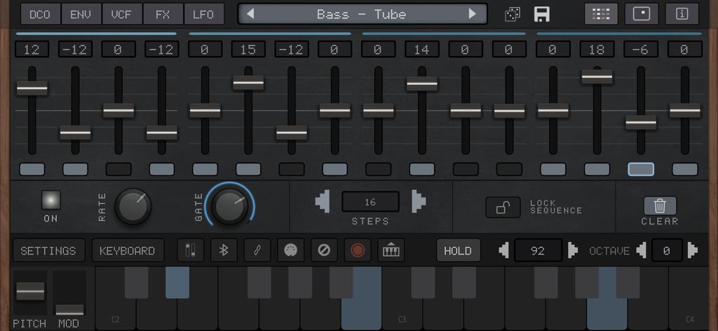 AudioKit Synth One J6 mobile app interface showing vintage-style sliders, knobs, and a piano keyboard for music production