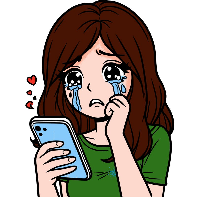 woman crying with her phone in her hand