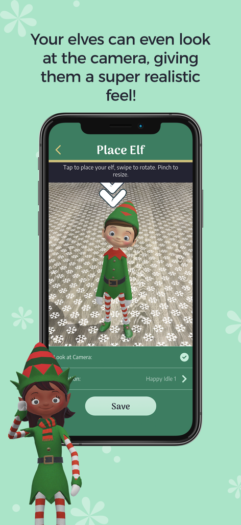Un écran de smartphone montrant un elfe en réalité augmentée d'Elf Studio regardant directement la caméra sur un sol à motif de flocons de neige.