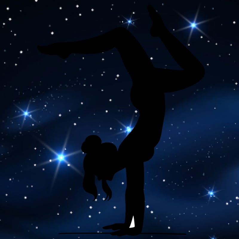 a woman doing a handstand