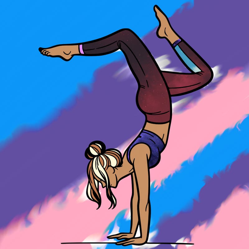 a woman doing a handstand