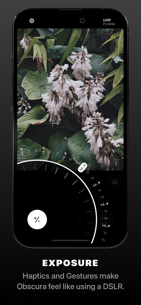 Obscura pro camera app interface showing manual exposure dial and a photo of white flowers