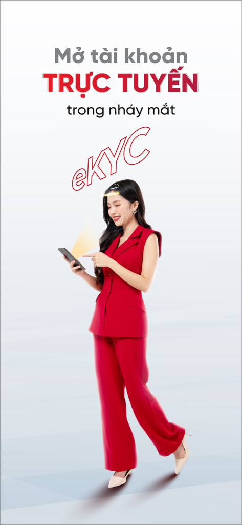 A woman in a red suit using facial recognition on her smartphone for Agribank Plus eKYC account opening
