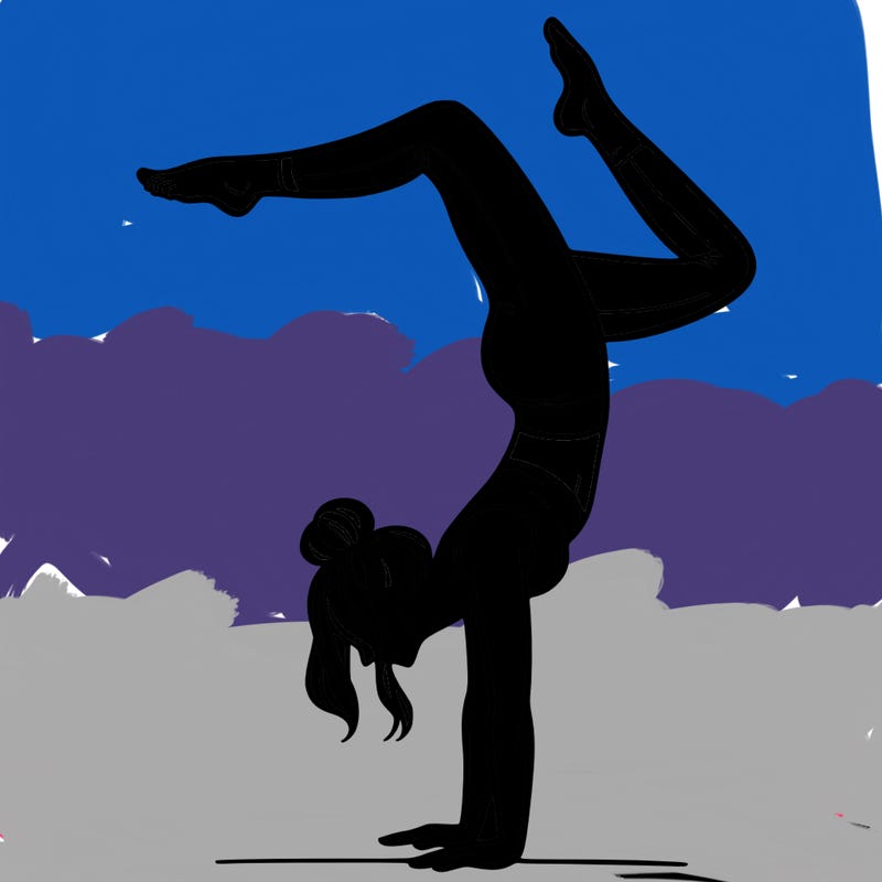 a woman doing a handstand