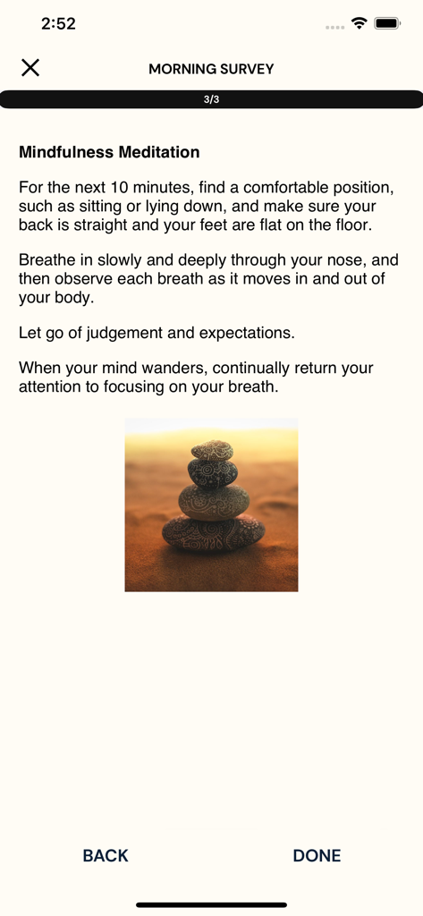 ExpiWell - ExpiWell app morning survey screen with mindfulness meditation instructions and stacked zen stones.