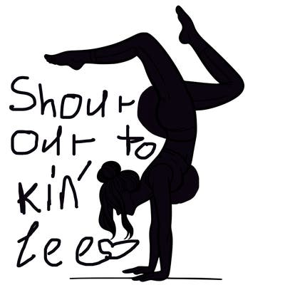 a woman doing a handstand