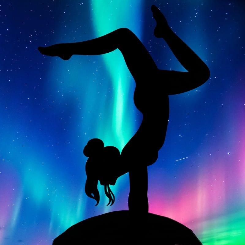 a woman doing a handstand