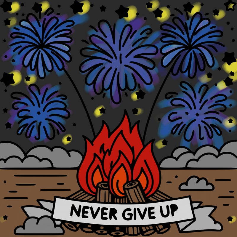 fire works with motivating message underneath "never give up"