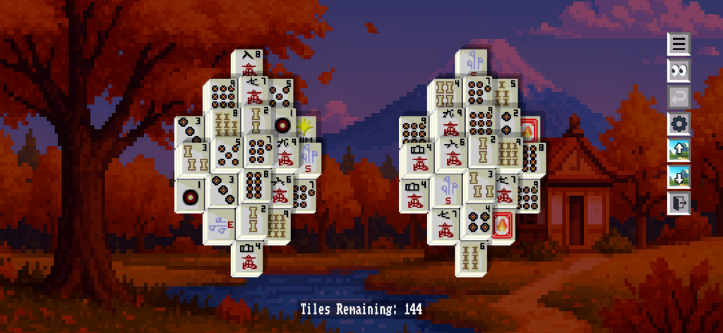 Leon's Mahjong solitaire with pixel art tiles and an autumn mountain landscape