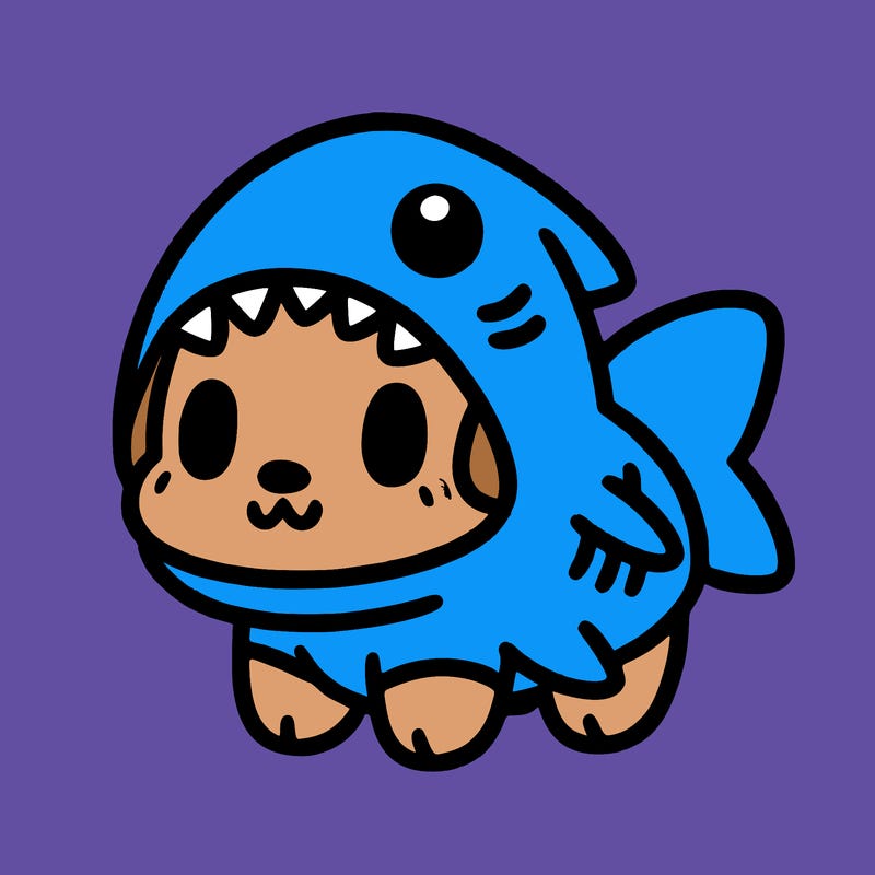 cute dog wearing a shark costume