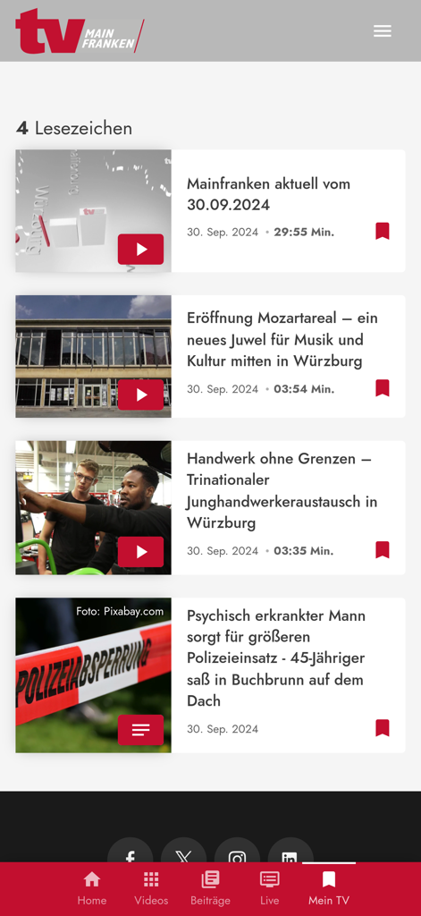 Lesezeichen-Seite der TV Mainfranken App mit einer Liste gespeicherter lokaler Nachrichten-Videos und Artikel.