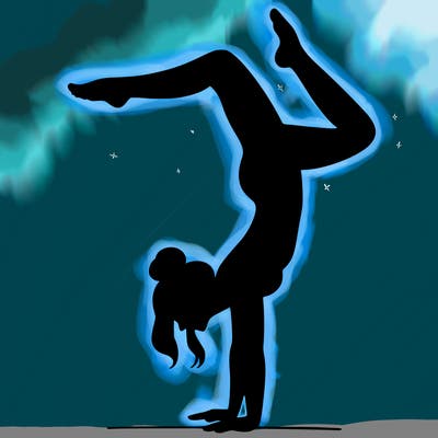 a woman doing a handstand