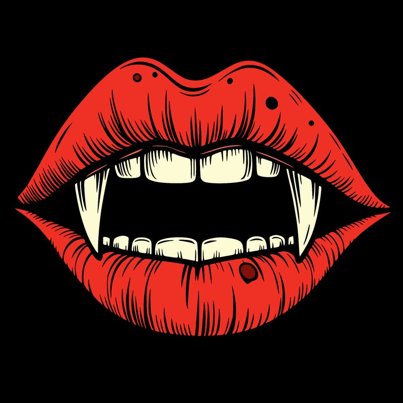 lips with vampire teeth