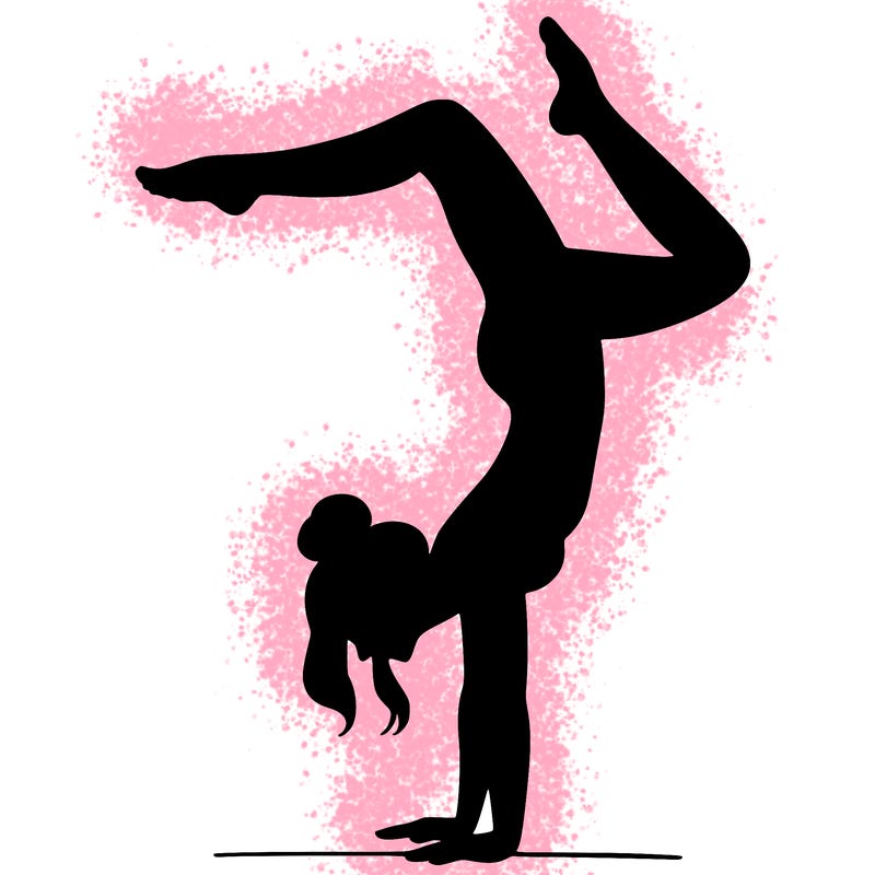a woman doing a handstand