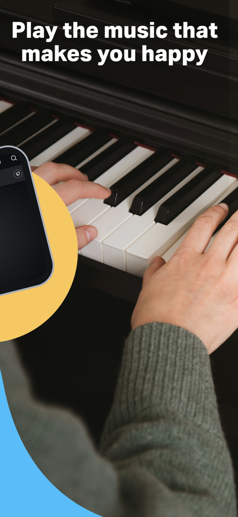 Piano by Yousician - Close up of a person playing the piano with a smartphone using the Piano by Yousician app