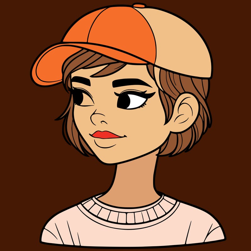 woman with short hair and a ball cap