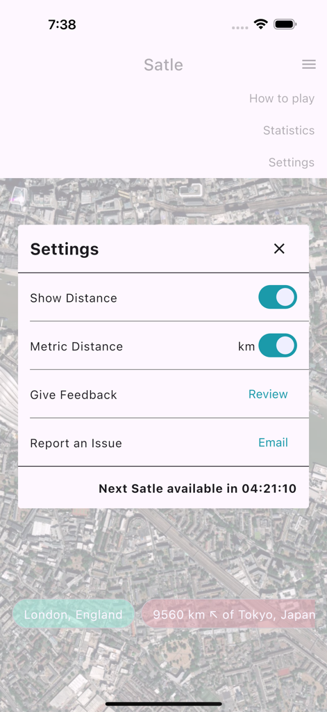 Settings interface for Satle geography game showing distance unit options and countdown for the next daily challenge