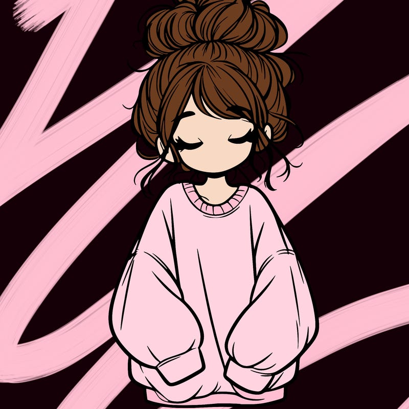 girl with baggy sweatshirt and messy bun