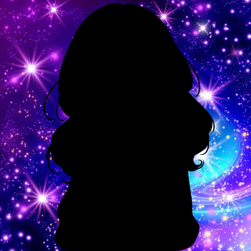 shy pretty girl wearing a sweater that is falling off one shoulder portrait