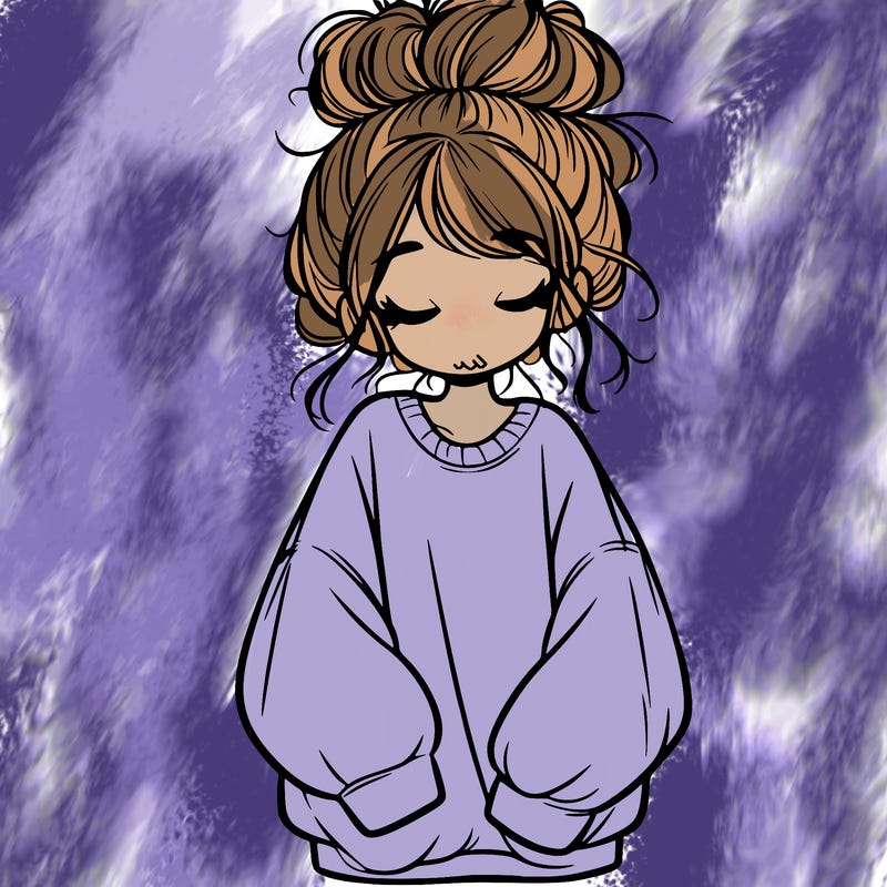 girl with baggy sweatshirt and messy bun