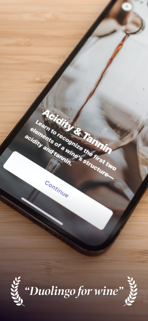 True Wine - Smartphone screen displaying a True Wine app lesson on acidity and tannin structure