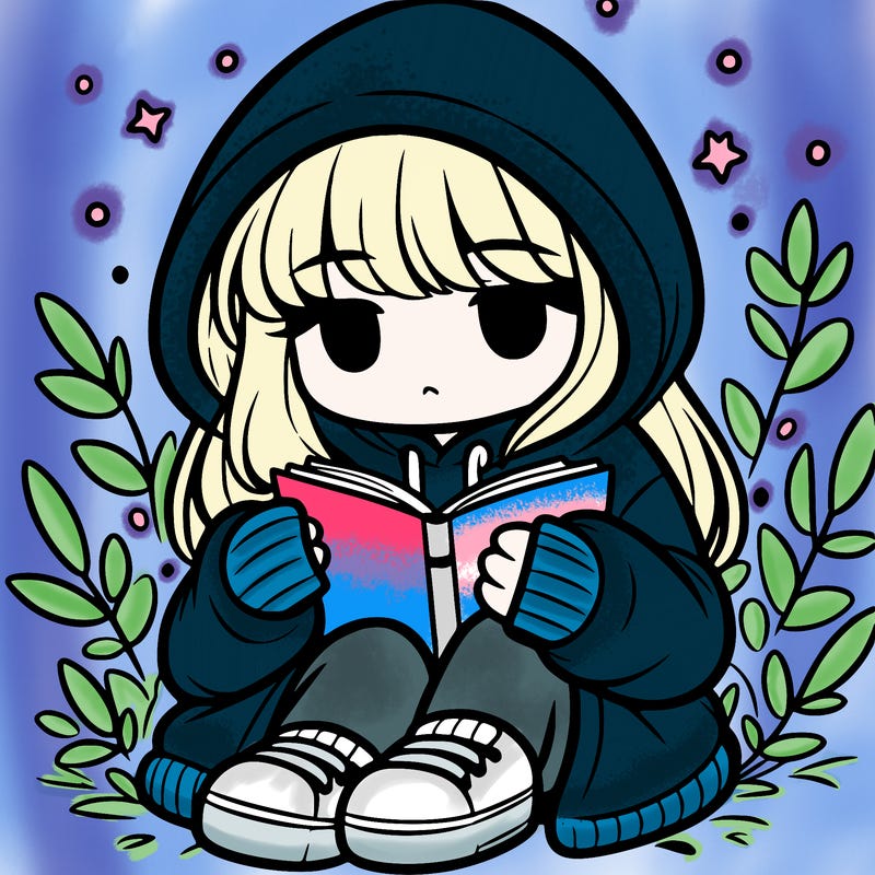 girl in oversized hoodie reading a book