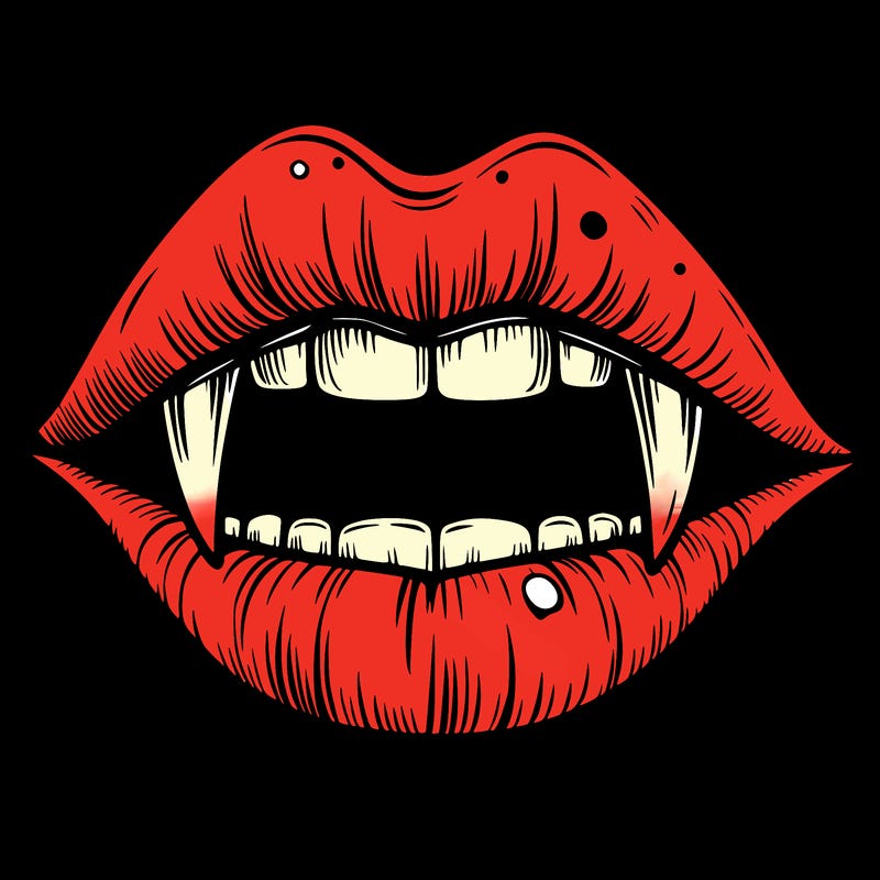 lips with vampire teeth
