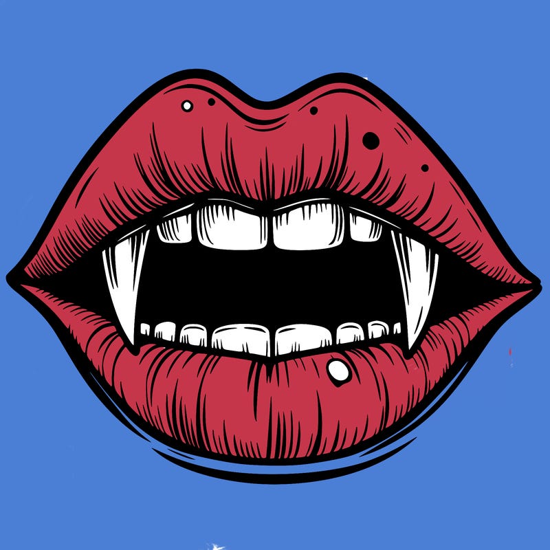 lips with vampire teeth
