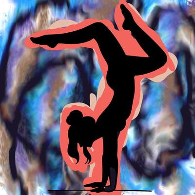 a woman doing a handstand