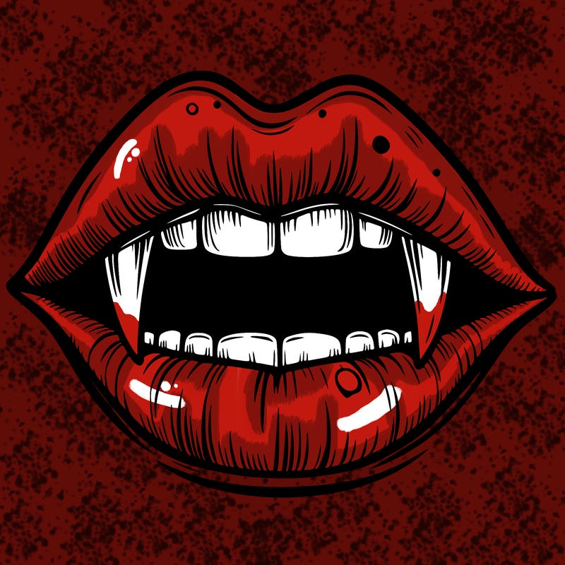 lips with vampire teeth