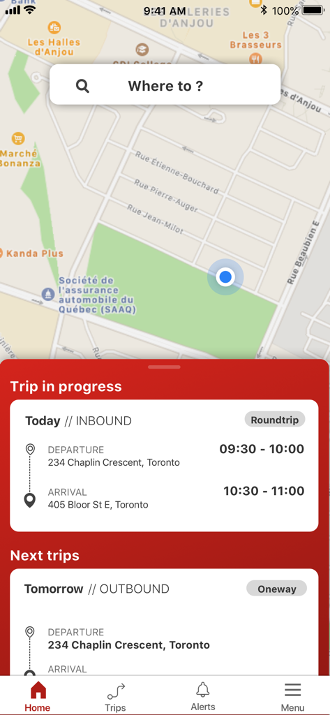Wheel-Transモバイルアプリのインターフェース。トロントへの inbound 旅のリアルタイムマップとスケジュールされた旅行の詳細を表示。