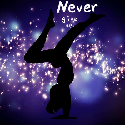 'woman doing a handstand