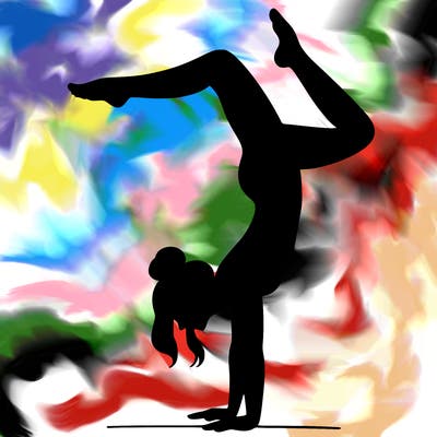 a woman doing a handstand