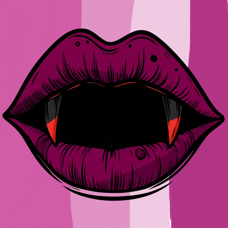 lips with vampire teeth