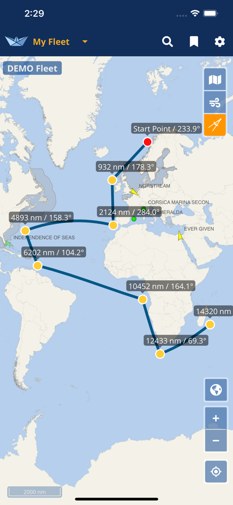 VesselFinder Lite app world map view featuring the distance measurement tool with maritime routes