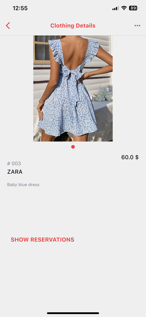 My Atelier Online - Mobile app screen showing the details and rental price of a blue floral dress