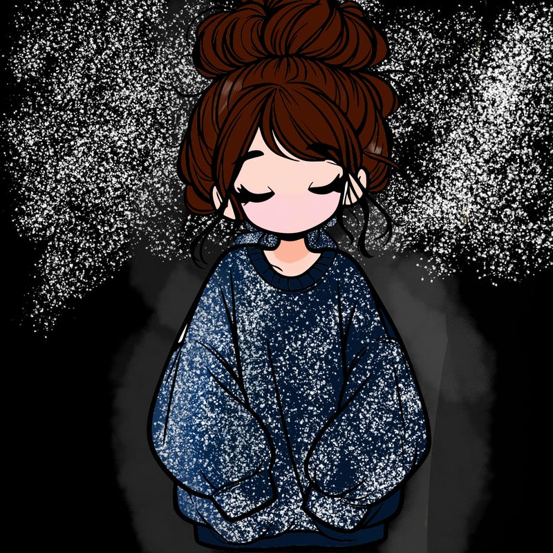 girl with baggy sweatshirt and messy bun